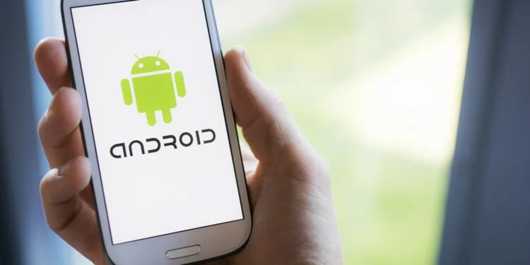 HILVERSUM, NETHERLANDS - MARCH 17, 2014: Android is an operating system based on the Linux kernel and designed for touchscreen mobile devices. The mobile HTC Dream, was successfully released in 2008.