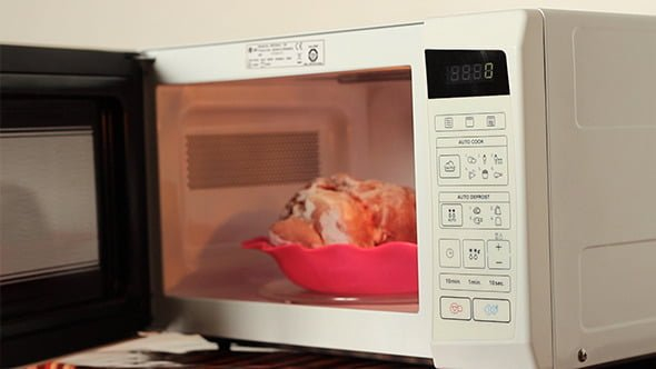 Defrost food using an oven